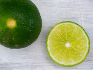 Fresh cuts organic lemon on wood