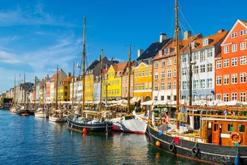 Fotobehang Scandinavië Nyhavn in Kopenhagen, Denemarken op een zonnige dag