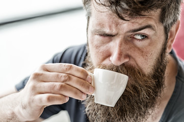 Coffee break concept. Guy relaxing with espresso coffee. Enjoy hot drink. Hipster drinking coffee...