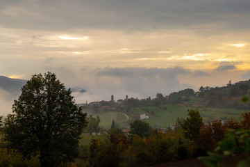 Photographs of views from Mount Penice of a cloudy landscape