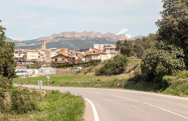 Rural village in Catalonia with the mountains of the Pyrenees in the background.
