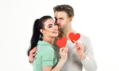 Romantic couple in love hug. Handsome unshaven man and pretty girl in love. Valentines day and...