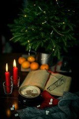 christmas still life with candle and decorations