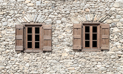 Fototapeta na wymiar Windows in a stone wall