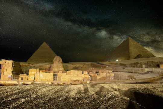 Giza Pyramids And Sphinx Light Up At Night