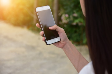 People are using mobile smart phone to shopping online,Hand holding internet smart phone