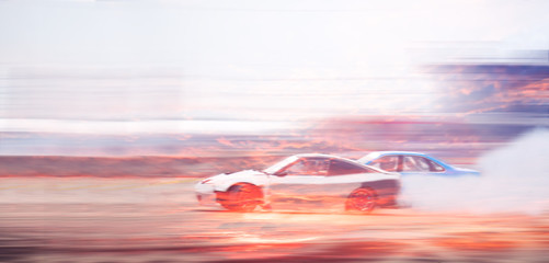 Blurred of image car drifting battle with sky and cloud, Double exposure. - obrazy, fototapety, plakaty