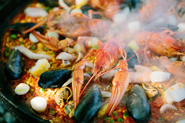 Cooking food on a fire.Picnic.Preparation of cooking paella.
