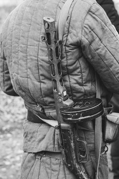 Soldier in a padded jacket with a gun ppsh