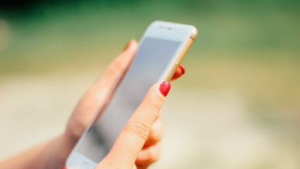 woman with smartphone close up