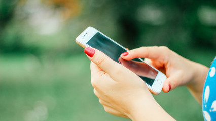 woman with smartphone close up