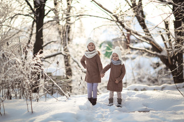 Fototapeta na wymiar Happy childhood. children playing outside winter