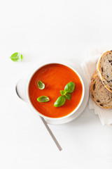 tomato soup flat lay on white backgorund