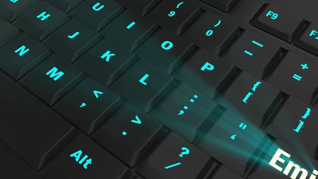 pointing the camera on blue glowing Emigrate key on black computer keyboard