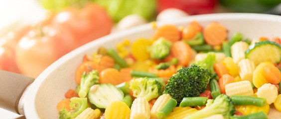 Fresh vegetables fried in a pan. Healthy nutrition concept