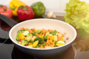 Fresh vegetables fried in a pan. Healthy nutrition concept