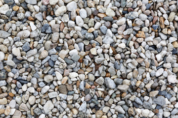 Close-up texture of colorful sea pebbles. Small Rock. Sea background