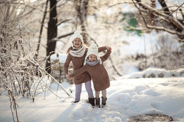 Happy childhood. children playing outside winter