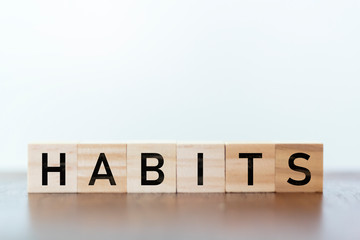 Habits word written on wooden cubes