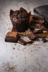 Chocolate muffin with broken chocolate bars