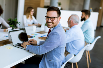 Business people discussing a strategy and working together in office