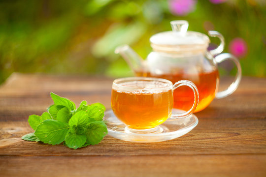 delicious green tea in a beautiful glass bowl on table