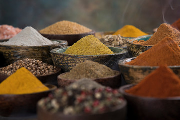 Variety of spices and herbs on kitchen table