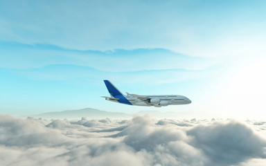 Naklejka na ściany i meble Airplane above the clouds.
