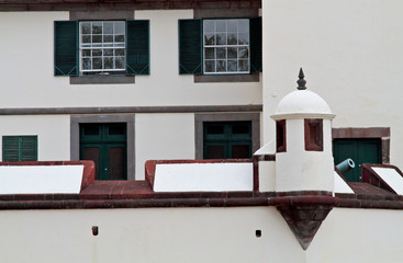 Old house with window shutters opened  in Madeira island