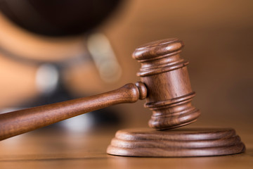 Globe, Law theme, mallet of judge, wooden gavel