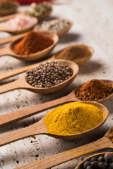 Hot spices in wooden bowls