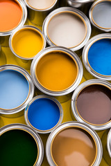 Brush, metal cans with color paint