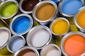 Fototapeta premium Colours paint can, yellow background