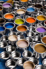 Collection of colored paints cans