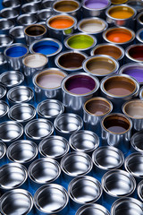 Collection of colored paints cans