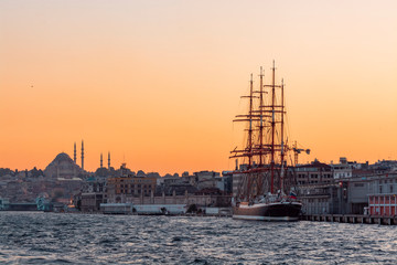 Istanbul, Turkey. Sunset and  beautiful sailing ship.