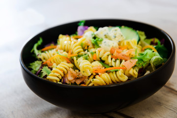 tasty pasta with salmon on a the table