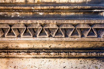 Abstract antique stone wall ornament of Notre Dame