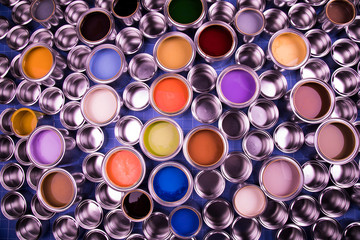 Collection of colored paints cans