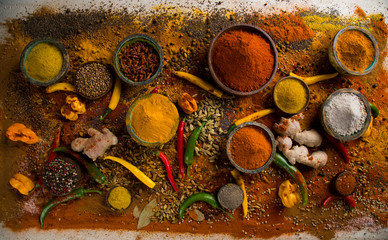 Aromatic spices on wooden background