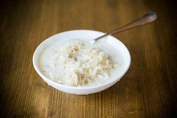 homemade sweet noodles with milk in a plate