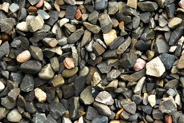 Textured background of crushed stones