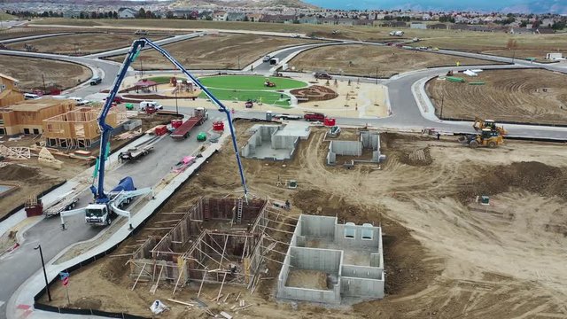 Panning aerial video of winter housing construction