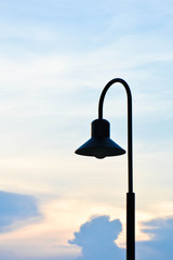Fototapeta na wymiar modern street light lamp in countryside at evening time