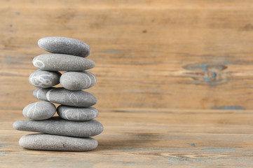 Fototapeta na wymiar Therapy zen stones on wood