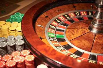 Gambling roulette with chips in the casino