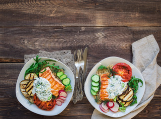 Grilled salmon, eggplants and tomatoes with quinoa and tzatziki sauce