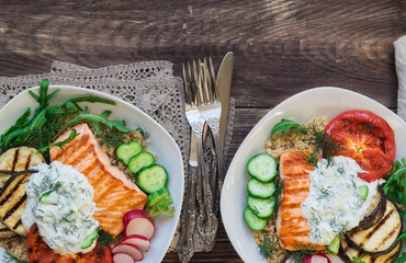 Grilled salmon, eggplants and tomatoes with quinoa and tzatziki sauce