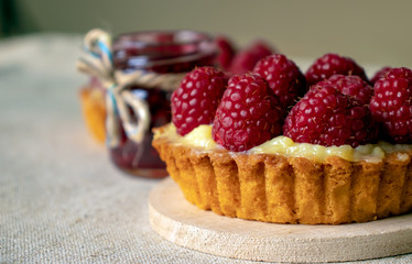 Raspberry cake and raspberry jam close-up