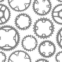 Vector seamless pattern with bike chainrings (chainwheels, sprockets) isolated on white background.